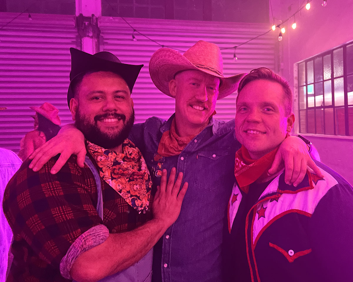 Clint, Scott and Ian wearing cowboy outfits and cheeky smiles at the Perth Barn Dance, August 2022